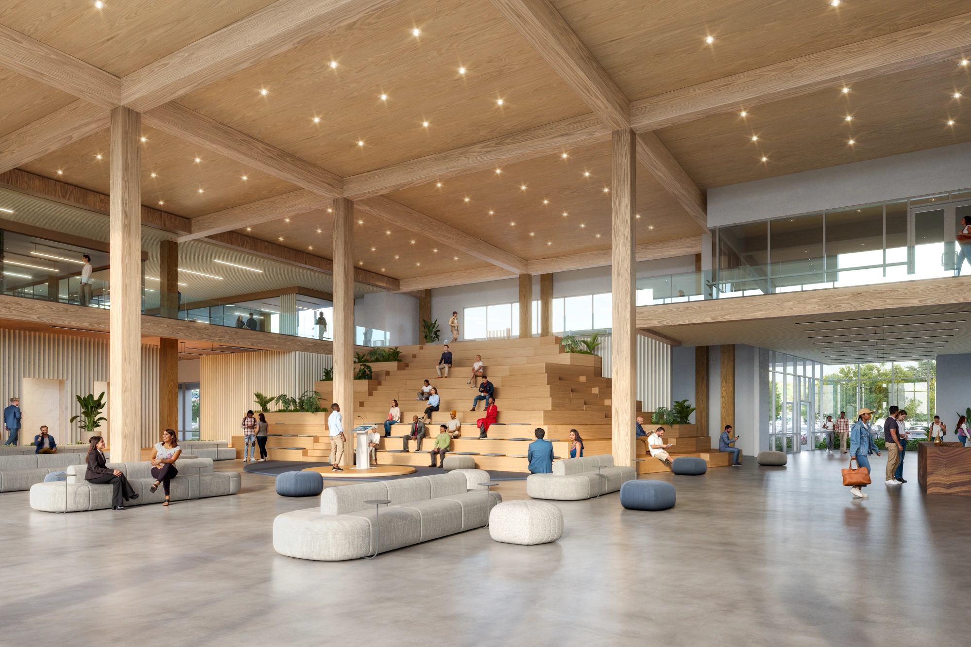 Spacious workplace interior with amphitheater steps soft seating and glass railings