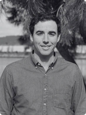 Corporate portrait featuring male professional in button down shirt