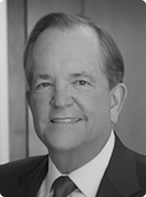Corporate executive portrait featuring mature man in formal business attire